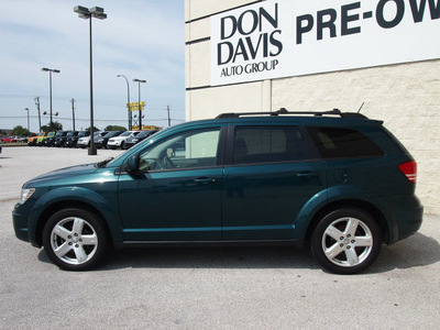 dodge journey 2009 dk  green suv sxt gasoline 6 cylinders front wheel drive automatic 76011