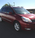 toyota sienna 2004 red van xle limited 7 passenger 6 cylinders automatic 99352