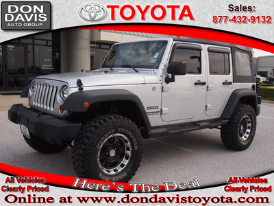 jeep wrangler unlimited 2011 silver suv sport gasoline 6 cylinders 4 wheel drive automatic 76011