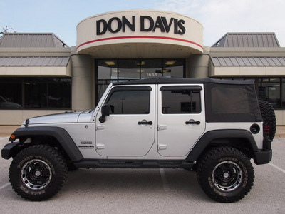 jeep wrangler unlimited 2011 silver suv sport gasoline 6 cylinders 4 wheel drive automatic 76011