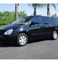 kia sedona 2010 black van 6 cylinders automatic 78550