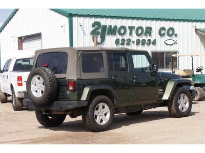 jeep wrangler unlimited 2007 green suv sahara gasoline 6 cylinders 4 wheel drive automatic 79119