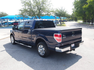 ford f 150 2010 blue xlt 8 cylinders automatic 76049