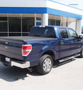ford f 150 2010 blue xlt 8 cylinders automatic 76049
