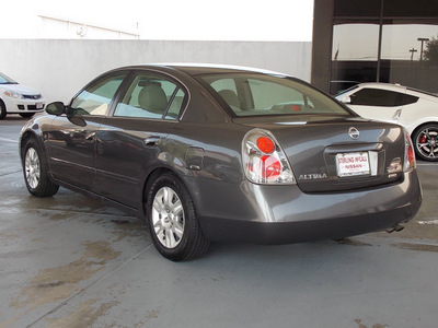 nissan altima 2006 gray sedan 2 5 s gasoline 4 cylinders front wheel drive automatic with overdrive 77477