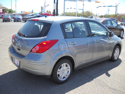 nissan versa 2011 gray hatchback gasoline 4 cylinders front wheel drive automatic 79925