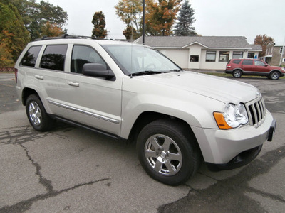 jeep grand cherokee 2010 tan suv laredo gasoline 6 cylinders 4 wheel drive automatic 13502