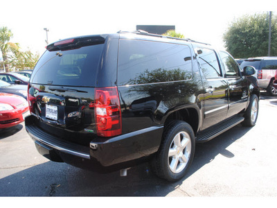 chevrolet suburban 2011 black suv ltz flex fuel 8 cylinders 2 wheel drive automatic with overdrive 77581