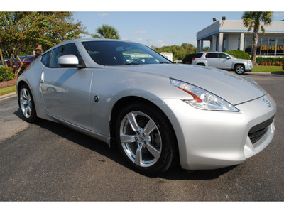 nissan 370z 2011 silver coupe gasoline 6 cylinders rear wheel drive automatic with overdrive 77581