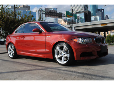 bmw 1 series 2009 red coupe 135i 6 cylinders 6 speed manual 77002
