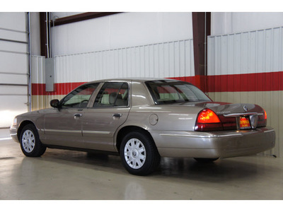 mercury grand marquis 2004 gold sedan gs gasoline 8 cylinders rear wheel drive automatic 79110