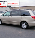toyota sienna 2005 gold van xle limited 7 passenger gasoline 6 cylinders front wheel drive automatic 55124