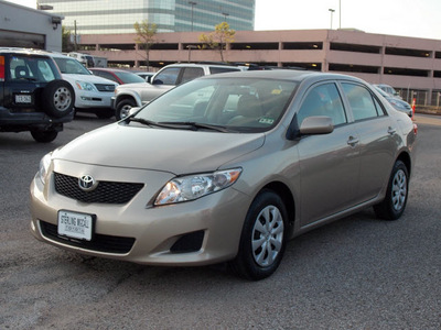 toyota corolla 2010 tan sedan le gasoline 4 cylinders front wheel drive automatic with overdrive 77074