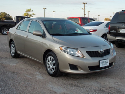 toyota corolla 2010 tan sedan le gasoline 4 cylinders front wheel drive automatic with overdrive 77074