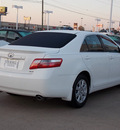 toyota camry 2007 white sedan xle v6 6 cylinders automatic with overdrive 77074