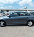 volkswagen jetta 2011 gray sedan 4 cylinders shiftable automatic 77074