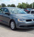 volkswagen jetta 2011 gray sedan 4 cylinders shiftable automatic 77074