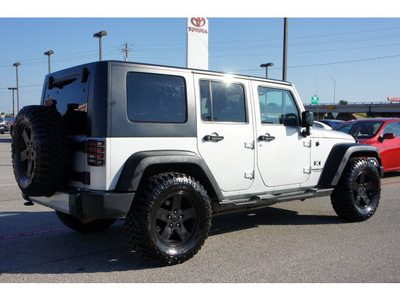 jeep wrangler unlimited 2009 silver suv x gasoline 6 cylinders 2 wheel drive automatic 76543