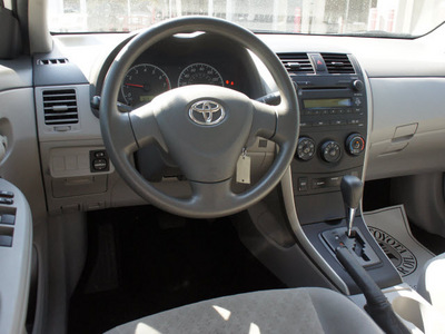 toyota corolla 2009 white sedan le gasoline 4 cylinders front wheel drive automatic 75110