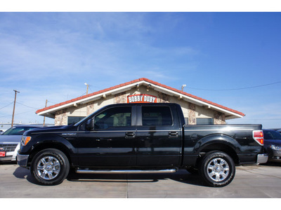 ford f 150 2010 black xlt gasoline 8 cylinders 2 wheel drive automatic 79110