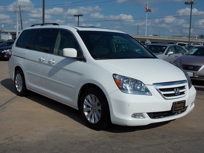 honda odyssey 2006 white van touring gasoline 6 cylinders front wheel drive automatic with overdrive 77074