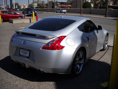 nissan 370z 2009 silver coupe 6 cylinders standard 79925