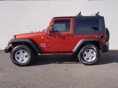 jeep wrangler 2009 orange suv x 6 cylinders 6 speed manual 98371