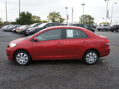 toyota yaris 2009 red sedan gasoline 4 cylinders front wheel drive automatic 19153