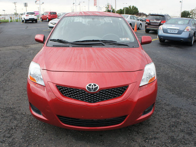 toyota yaris 2009 red sedan gasoline 4 cylinders front wheel drive automatic 19153