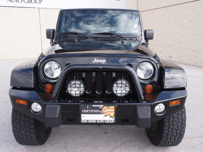 jeep wrangler unlimited 2010 black suv sahara gasoline 6 cylinders 4 wheel drive automatic with overdrive 76011