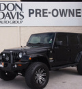 jeep wrangler unlimited 2010 black suv sahara gasoline 6 cylinders 4 wheel drive automatic with overdrive 76011