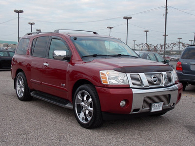 nissan armada 2005 dk  red suv le 8 cylinders automatic with overdrive 77074