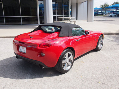 pontiac solstice 2009 red gxp gasoline 4 cylinders rear wheel drive automatic 76049