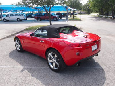pontiac solstice 2009 red gxp gasoline 4 cylinders rear wheel drive automatic 76049