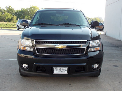 chevrolet suburban 2011 black suv lt 1500 8 cylinders automatic with overdrive 77074