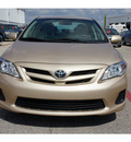 toyota corolla 2011 gold sedan le gasoline 4 cylinders front wheel drive automatic 76543