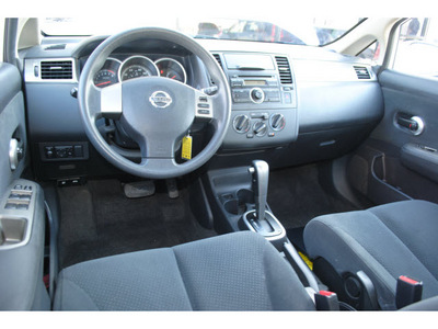 nissan versa 2011 white hatchback gasoline 4 cylinders front wheel drive automatic 78552