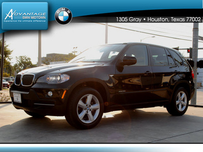 bmw x5 2010 black suv xdrive30i gasoline 6 cylinders all whee drive automatic 77002