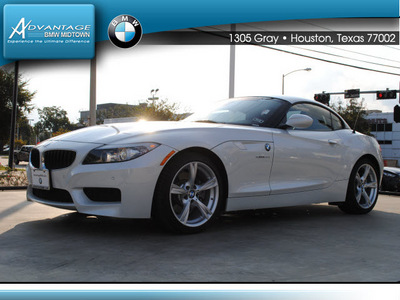 bmw z4 2012 white sdrive28i gasoline 4 cylinders rear wheel drive 6 speed manual 77002