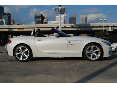 bmw z4 2012 white sdrive28i gasoline 4 cylinders rear wheel drive 6 speed manual 77002