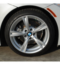 bmw z4 2012 white sdrive28i gasoline 4 cylinders rear wheel drive 6 speed manual 77002