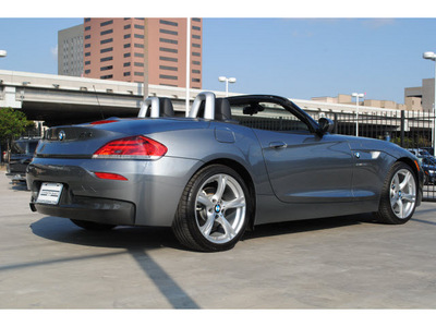 bmw z4 2012 dk  gray sdrive28i gasoline 4 cylinders rear wheel drive 6 speed manual 77002