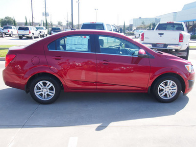 chevrolet sonic 2012 red sedan gasoline 4 cylinders front wheel drive 6 spd auto connivity plus cruise pkg lpo,all wthr flr mats l 77090