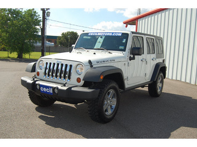 jeep wrangler unlimited 2010 white suv rubicon 6 cylinders automatic with overdrive 77632