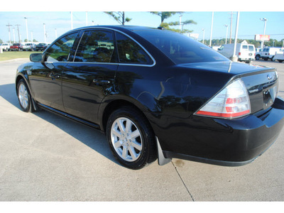 ford taurus 2009 black sedan se gasoline 6 cylinders front wheel drive automatic with overdrive 77539