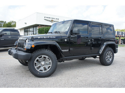 jeep wrangler unlimited 2013 black suv rubicon gasoline 6 cylinders 4 wheel drive automatic 77515