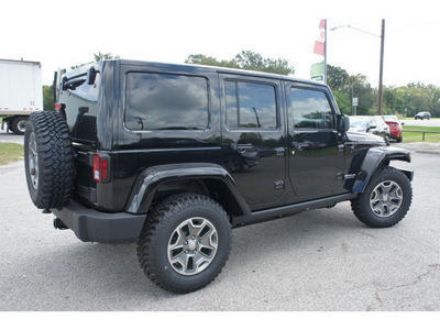 jeep wrangler unlimited 2013 black suv rubicon gasoline 6 cylinders 4 wheel drive automatic 77515