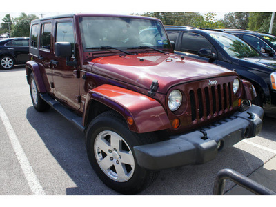 jeep wrangler unlimited 2007 red suv sahara gasoline 6 cylinders rear wheel drive automatic 78729