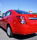 chevrolet sonic 2013 red sedan lt 4 cylinders automatic 27330
