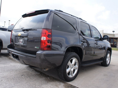 chevrolet tahoe 2011 dk  gray suv lt flex fuel 8 cylinders 2 wheel drive automatic 75007